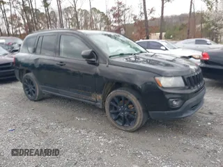 2014 Jeep Compass Sport with VIN 1C4NJCBA9ED823228, listed as a IAAI auction lot 41714992 with 168,996 mi miles. Bid and sale history available at carsss.com. Image 1.