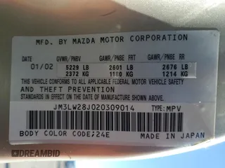 2002 Mazda MPV LX with VIN JM3LW28J020309014, listed as a Copart auction lot 81004584 with 249,161 mi miles and Salvage title. Bid and sale history available at DreamBid. Image 15.