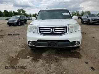 2013 Honda Pilot Touring z VIN 5FNYF4H91DB062722, wystawiony jako Copart lot #58308165 z przebiegiem 130 896 mil mil oraz Szkoda całkowita • Salvage title. Historia ofert i sprzedaży dostępna na DreamBid. Obrazek 14.