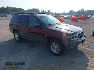 2002 Jeep Grand Cherokee with VIN 1J8GW48N02C235867, listed as a IAAI auction lot 42410586 with 166,790 mi miles and . Bid and sale history available at DreamBid. Image 1.