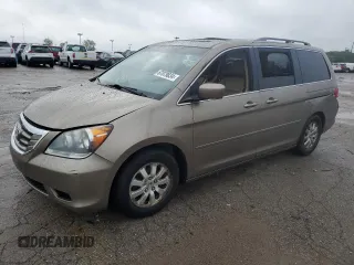2010 Honda Odyssey EX-L with VIN 5FNRL3H6XAB093864, listed as a Copart auction lot 67587954 with 0 mi miles and Salvage Title. Bid and sale history available at carsss.com. Image 1.