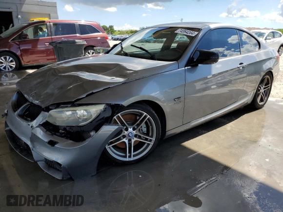 2011 BMW 3 Series 335is with VIN WBAKG1C52BE617713, listed as a Copart auction lot 74064204 with 132,742 mi miles and Salvage Title. Bid and sale history available at carsss.com. Image 1.