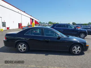 2001 Lincoln LS z VIN 1LNHM86S71Y620289, wystawiony jako IAAI lot #42105386 z przebiegiem 74 148 mil mil oraz . Historia ofert i sprzedaży dostępna na DreamBid. Obrazek 13.