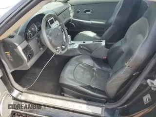 2004 Chrysler Crossfire z VIN 1C3AN69LX4X023972, wystawiony jako Copart lot #49111475 z przebiegiem 208 710 mil mil oraz Szkoda całkowita • Salvage title. Historia ofert i sprzedaży dostępna na DreamBid. Obrazek 7.