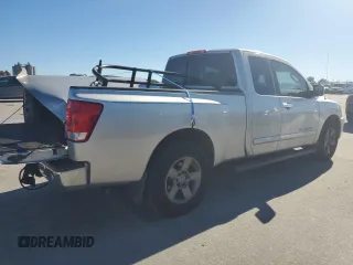 2005 Nissan Titan SE z VIN 1N6AA06AX5N500773, wystawiony jako Copart lot #81695634 z przebiegiem 127 210 mil mil oraz Szkoda całkowita • Salvage title. Historia ofert i sprzedaży dostępna na DreamBid. Obrazek 3.
