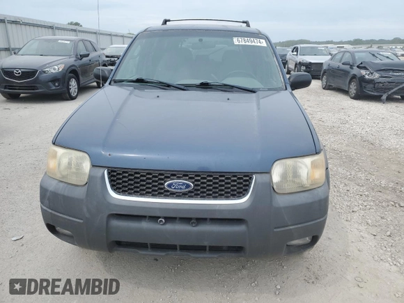 2001 Ford Escape XLT with VIN 1FMYU03131KF10968, listed as a Copart auction lot 67849474 with 197,328 mi miles and Salvage Title. Bid and sale history available at carsss.com. Image 5.