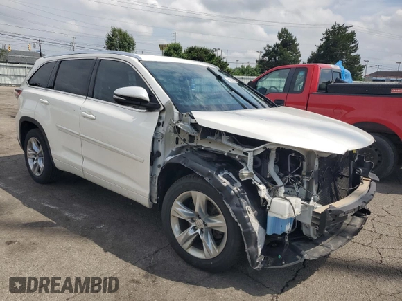 2014 Toyota Highlander Limited with VIN 5TDYKRFH9ES020475, listed as a Copart auction lot 58909925 with 216,857 mi miles and Salvage title. Bid and sale history available at DreamBid. Image 4.