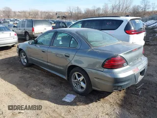 2004 Pontiac Grand Am SE1 with VIN 1G2NF52E04M653375, listed as a IAAI auction lot 41787184 with 100,062 mi miles. Bid and sale history available at carsss.com. Image 3.