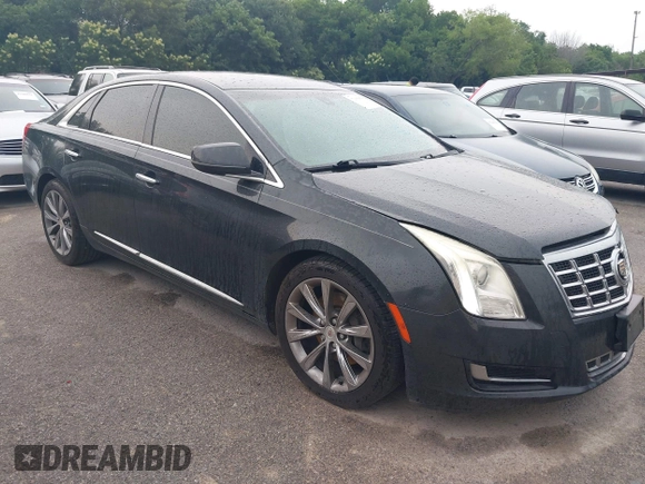 2014 Cadillac XTS z VIN 2G61L5S32E9326141, wystawiony jako IAAI lot #42300854 z przebiegiem 200 284 mil mil oraz . Historia ofert i sprzedaży dostępna na DreamBid. Obrazek 1.