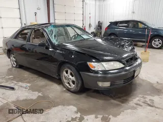 1999 Lexus ES 300 Luxury Sport Sdn with VIN JT8BF28G0X5065091, listed as a IAAI auction lot 41416601 with 236,606 mi miles. Bid and sale history available at carsss.com. Image 1.