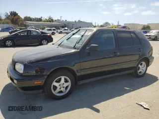 1997 Volkswagen Golf z VIN 3VWLB81H1VM098970, wystawiony jako Copart lot #52580705 z przebiegiem 193 509 mil mil oraz Czysty tytuł • Clean title. Historia ofert i sprzedaży dostępna na DreamBid. Obrazek 1.