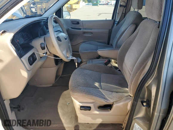 2001 Ford Windstar LX z VIN 2FMZA51441BA35669, wystawiony jako Copart lot #73283214 z przebiegiem 240 538 mil mil oraz Szkody całkowita. Historia ofert i sprzedaży dostępna na DreamBid. Obrazek 7.