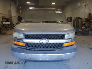 2009 Chevrolet Express Passenger z VIN 1GAGG25K691140635, wystawiony jako Copart lot #88503195 z przebiegiem 144 026 mil mil oraz Szkoda całkowita • Salvage title. Historia ofert i sprzedaży dostępna na DreamBid. Obrazek 5.