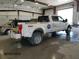 2019 Ford Super Duty F-450 DRW XL with VIN 1FT8W4DT0KEG00875, listed as a Copart auction lot 69857694 with 128,581 mi miles and Salvage Title. Bid and sale history available at carsss.com. Image 3.