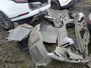 2018 Land Rover Range Rover Velar R-Dynamic SE z VIN SALYL2RV2JA718335, wystawiony jako Copart lot #78080104 z przebiegiem 134 835 mil mil oraz Szkoda całkowita • Salvage title. Historia ofert i sprzedaży dostępna na DreamBid. Obrazek 12.