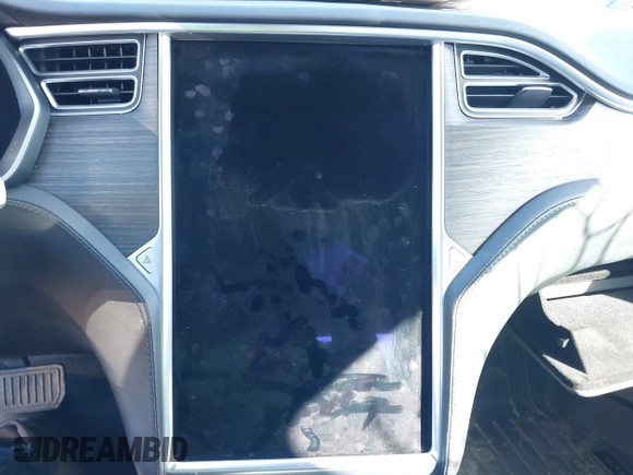 2016 Tesla Model S 90D with VIN 5YJSA1E22GF174301, listed as a IAAI auction lot 38867108 with 60,715 mi miles and . Bid and sale history available at DreamBid. Image 14.