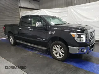 2017 Nissan Titan XD SL with VIN 1N6BA1F45HN513004, listed as a Copart auction lot 83622694 with 123,786 mi miles and Clean Title. Bid and sale history available at carsss.com. Image 4.