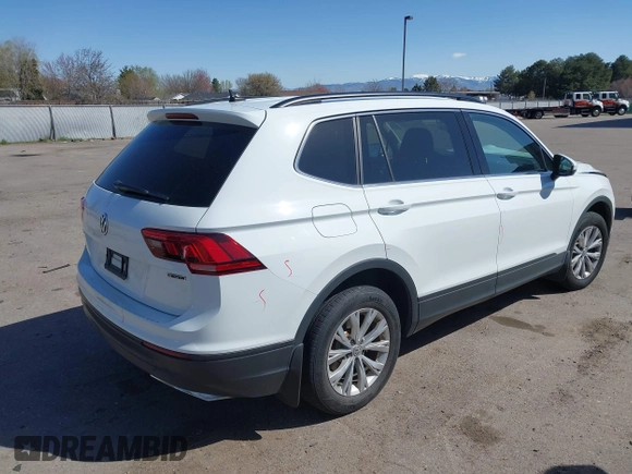 2019 Volkswagen Tiguan SE with VIN 3VV2B7AX8KM193166, listed as a IAAI auction lot 41957720 with 61,981 mi miles and . Bid and sale history available at DreamBid. Image 4.