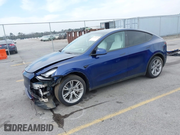 2023 Tesla Model Y Long Range with VIN 7SAYGDEE7PA194998, listed as a IAAI auction lot 41787170 with 16,221 mi miles and . Bid and sale history available at DreamBid. Image 17.
