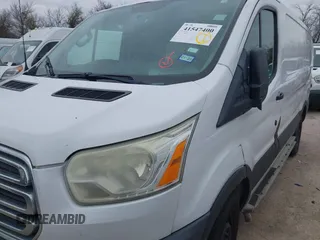 2015 Ford Transit Cargo with VIN 1FTNR1ZM0FKB02483, listed as a IAAI auction lot 41547400 with 317,720 mi miles and . Bid and sale history available at DreamBid. Image 2.