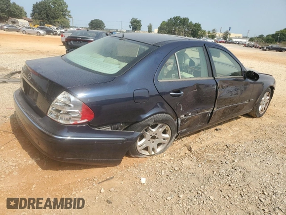 2003 Mercedes-Benz E-Class 3.2L with VIN WDBUF65JX3A313638, listed as a Copart auction lot 70869194 with 142,524 mi miles and Salvage Title. Bid and sale history available at carsss.com. Image 3.