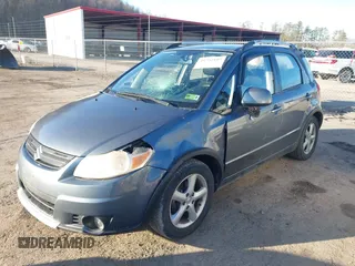 2008 Suzuki SX4 with VIN JS2YB417185102945, listed as a IAAI auction lot 41752107 with 164,656 mi miles and . Bid and sale history available at DreamBid. Image 2.