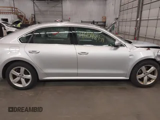 2013 Volkswagen Passat SE with VIN 1VWBH7A39DC145297, listed as a IAAI auction lot 42048991 with 146,897 mi miles and . Bid and sale history available at DreamBid. Image 14.