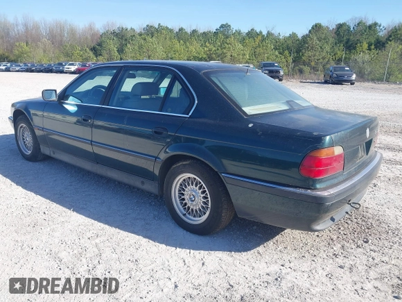 1998 BMW 7 Series 740il with VIN WBAGJ8323WDM13455, listed as a IAAI auction lot 41888636 with 1 mi miles. Bid and sale history available at carsss.com. Image 3.