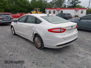 2014 Ford Fusion SE Hybrid with VIN 3FA6P0LU3ER312041, listed as a IAAI auction lot 41964588 with 138,566 mi miles and . Bid and sale history available at DreamBid. Image 3.