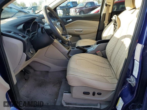 2014 Ford Escape SE z VIN 1FMCU9G95EUB88150, wystawiony jako Copart lot #52570095 z przebiegiem 143 129 mil mil oraz Szkoda całkowita • Salvage title. Historia ofert i sprzedaży dostępna na DreamBid. Obrazek 7.