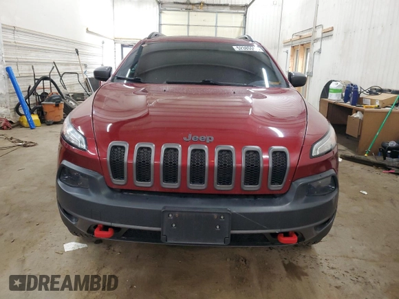 2015 Jeep Cherokee Trailhawk z VIN 1C4PJMBS9FW509642, wystawiony jako Copart lot #52385555 z przebiegiem 135 477 mil mil oraz Szkoda całkowita • Salvage title. Historia ofert i sprzedaży dostępna na DreamBid. Obrazek 5.