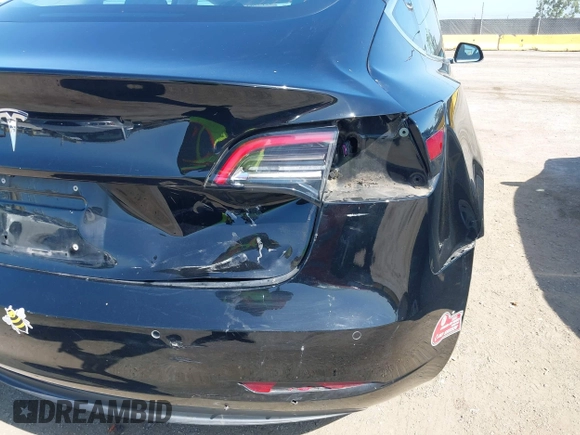 2018 Tesla Model 3 Long Range Battery with VIN 5YJ3E1EA7JF057031, listed as a IAAI auction lot 42139832 with 92,618 mi miles and . Bid and sale history available at DreamBid. Image 18.
