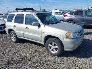 2005 Mazda Tribute S with VIN 4F2CZ96105KM04032, listed as a IAAI auction lot 42157429 with 199,704 mi miles and . Bid and sale history available at carsss.com. Image 1.