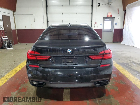 2019 BMW 7 Series 740i xDrive with VIN WBA7E4C50KGV28708, listed as a Copart auction lot 55141895 with 130,925 mi miles and Clean title. Bid and sale history available at DreamBid. Image 6.