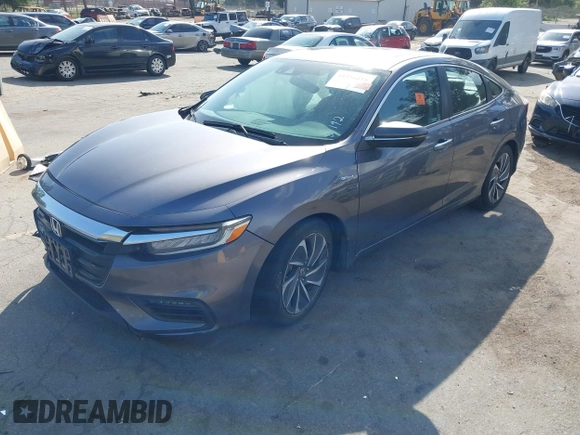 2019 Honda Insight Touring with VIN 19XZE4F95KE001192, listed as a IAAI auction lot 41956216 with Not Provided miles and . Bid and sale history available at carsss.com. Image 2.