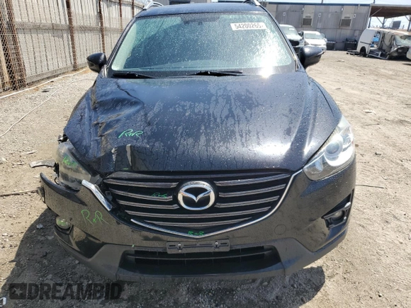 2016 Mazda CX-5 Grand Touring with VIN JM3KE2DY9G0777073, listed as a Copart auction lot 54200265 with 110,121 mi miles and Salvage Title. Bid and sale history available at carsss.com. Image 5.