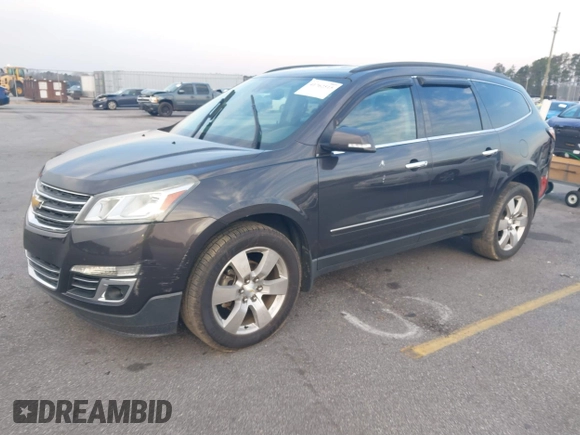 2015 Chevrolet Traverse LTZ with VIN 1GNKVJKDXFJ206159, listed as a IAAI auction lot 41762515 with 143,062 mi miles and . Bid and sale history available at DreamBid. Image 2.