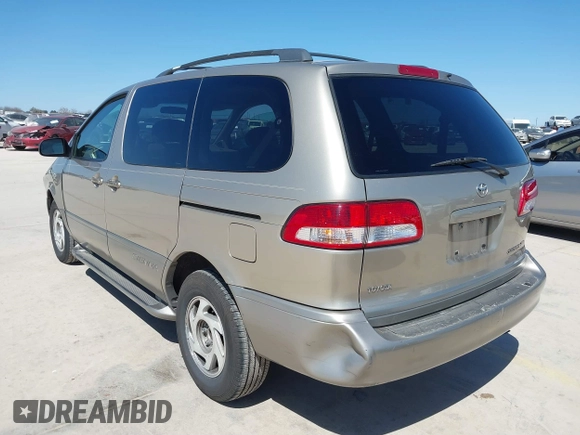 2001 Toyota Sienna LE with VIN 4T3ZF13C21U319690, listed as a IAAI auction lot 41729102 with 178,181 mi miles. Bid and sale history available at carsss.com. Image 3.