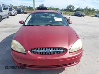 2002 Ford Taurus SES Standard with VIN 1FAFP55S42A135871, listed as a IAAI auction lot 40822596 with 185,605 mi miles. Bid and sale history available at carsss.com. Image 12.