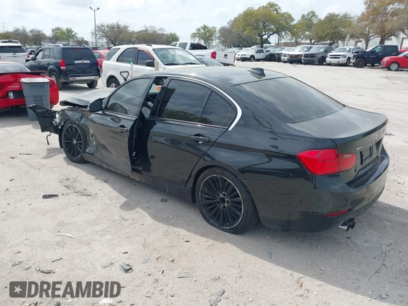 2013 BMW 3 Series 328i xDrive with VIN WBA3B5C53DF591002, listed as a IAAI auction lot 38877599 with 136,098 mi miles and . Bid and sale history available at DreamBid. Image 3.