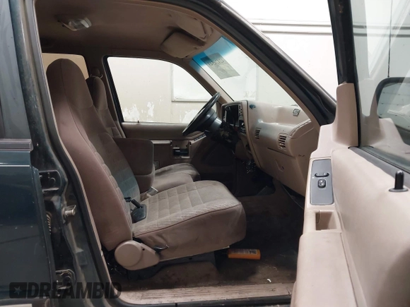 1994 Ford Explorer Eddie Bauer z VIN 1FMDU34X7RUD15166, wystawiony jako IAAI lot #42426543 z przebiegiem 168 233 mil mil oraz . Historia ofert i sprzedaży dostępna na DreamBid. Obrazek 5.
