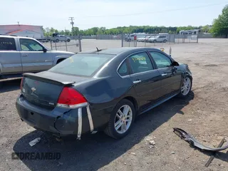 2014 Chevrolet Impala LTZ with VIN 2G1WC5E3XE1161316, listed as a IAAI auction lot 42081694 with 129,353 mi miles and . Bid and sale history available at DreamBid. Image 4.