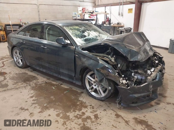 2016 Audi A6 2.0T Premium Plus with VIN WAUGFAFC8GN088505, listed as a IAAI auction lot 41569043 with 98,528 mi miles. Bid and sale history available at carsss.com. Image 1.