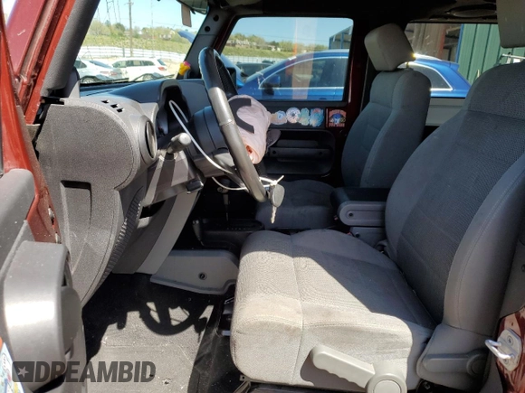 2007 Jeep Wrangler Sahara with VIN 1J4FA54167L163567, listed as a Copart auction lot 55229305 with 153,879 mi miles and Non repairable. Bid and sale history available at DreamBid. Image 7.