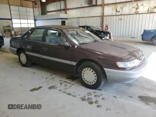 1992 Ford Taurus z VIN 1FACP50U4NA144506, wystawiony jako Copart lot #80000064 z przebiegiem 40 600 mil mil oraz Czysty tytuł • Clean title. Historia ofert i sprzedaży dostępna na DreamBid. Obrazek 4.