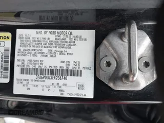 2014 Ford Fusion SE Hybrid with VIN 3FA6P0LUXER236740, listed as a IAAI auction lot 41399510 with 82,720 mi miles. Bid and sale history available at carsss.com. Image 9.