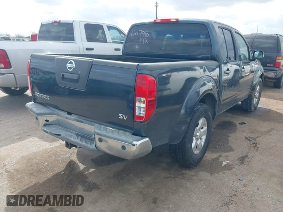 2013 Nissan Frontier SV with VIN 1N6AD0ER3DN746142, listed as a IAAI auction lot 41519017 with 166,482 mi miles and . Bid and sale history available at DreamBid. Image 4.