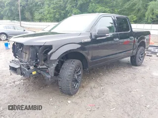 2019 Ford F-150 XL with VIN 1FTEW1C43KFC10164, listed as a IAAI auction lot 42342646 with 93,377 mi miles and . Bid and sale history available at DreamBid. Image 2.