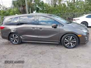 2020 Honda Odyssey Elite with VIN 5FNRL6H91LB030294, listed as a IAAI auction lot 41608291 with 74,477 mi miles and . Bid and sale history available at DreamBid. Image 13.