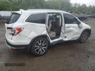 2021 Honda Pilot Touring 7-Passenger z VIN 5FNYF6H64MB004962, wystawiony jako Copart lot #57860225 z przebiegiem 52 311 mil mil oraz Szkoda całkowita • Salvage title. Historia ofert i sprzedaży dostępna na DreamBid. Obrazek 3.